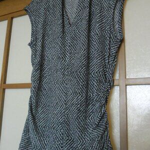 Two tops with ruched sides. Label says small but fits more like  a medium.